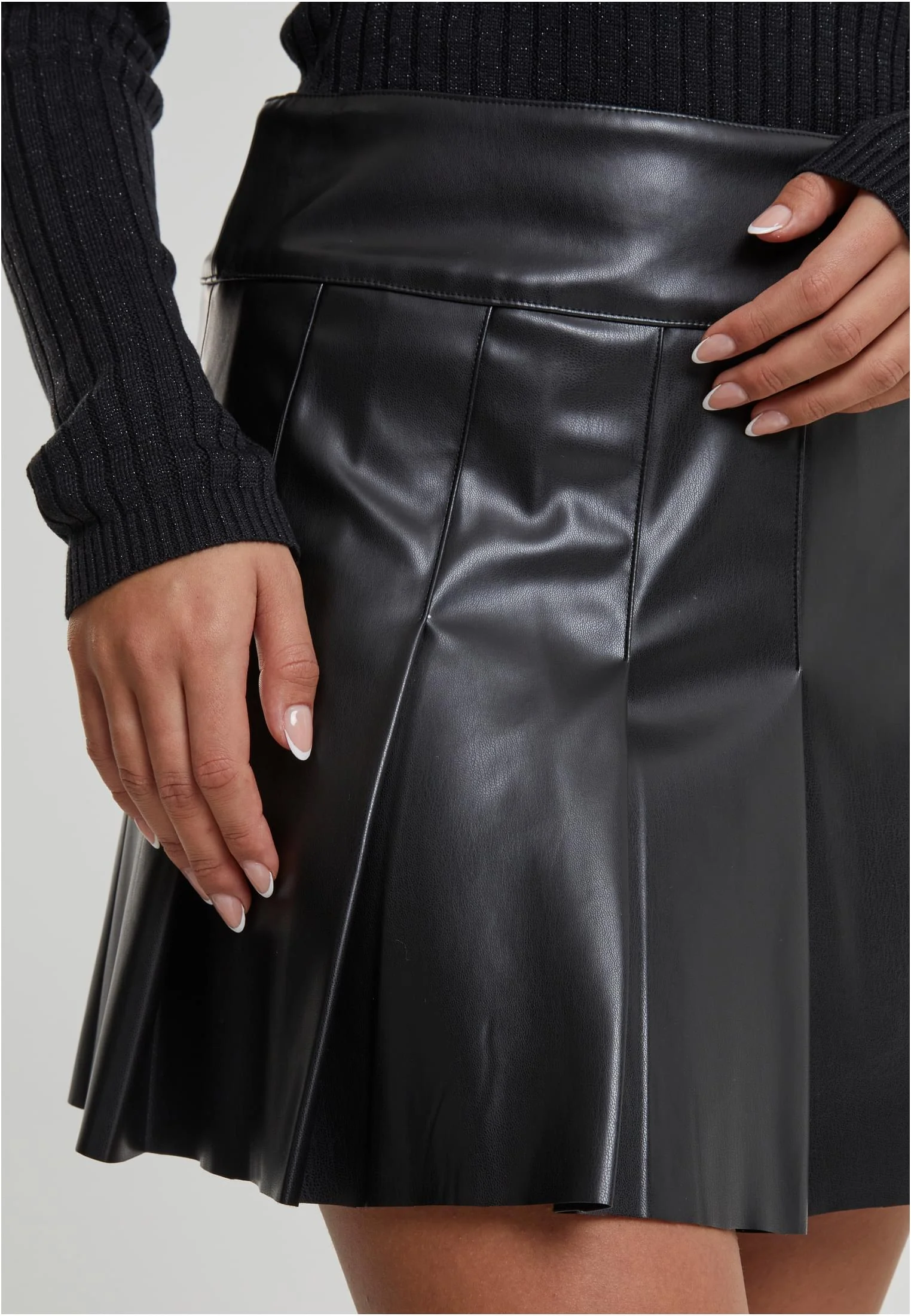 Ladies Synthetic Leather Pleated Skirt